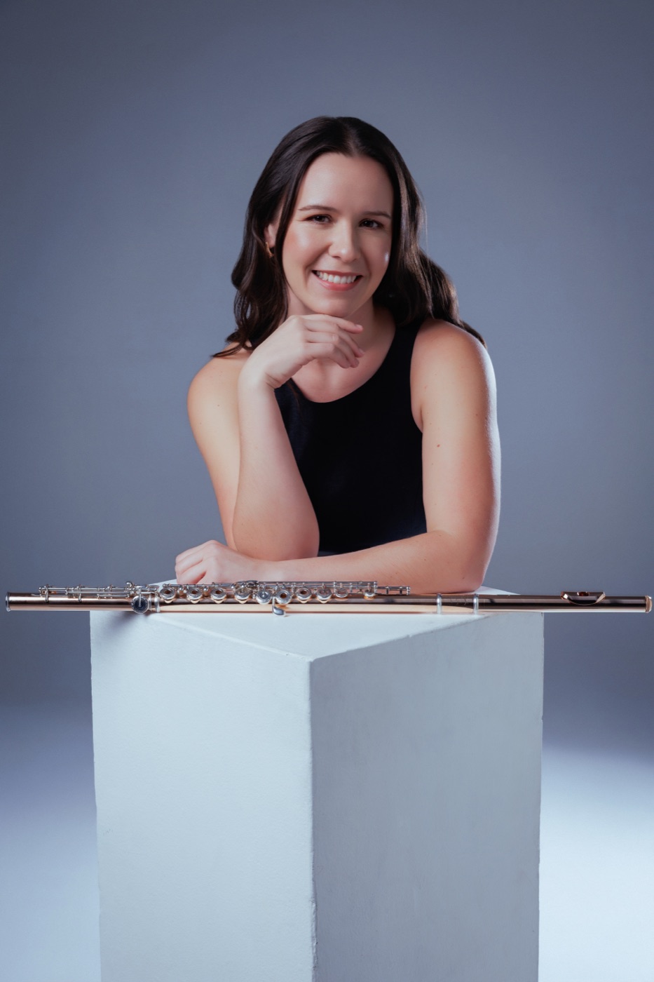 Lauren with her flute in the studio
